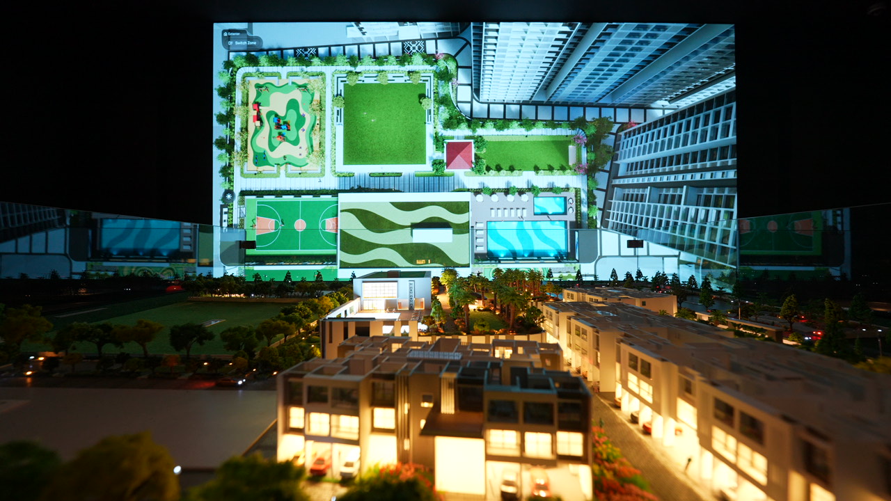 Illuminated scale model with digital amenity and master plan visualization