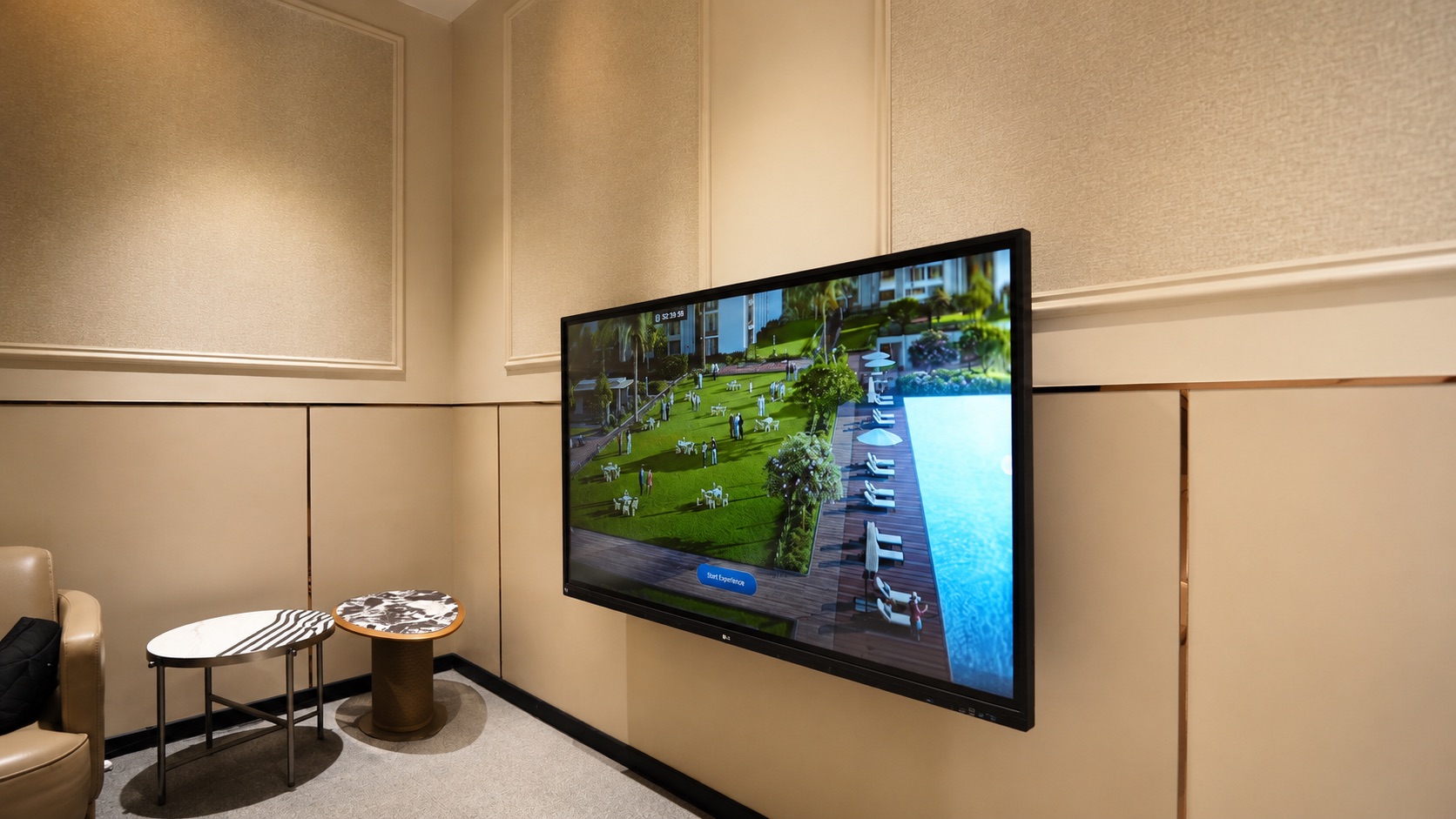 Interactive amenity walkthrough screen inside a real estate experience centre