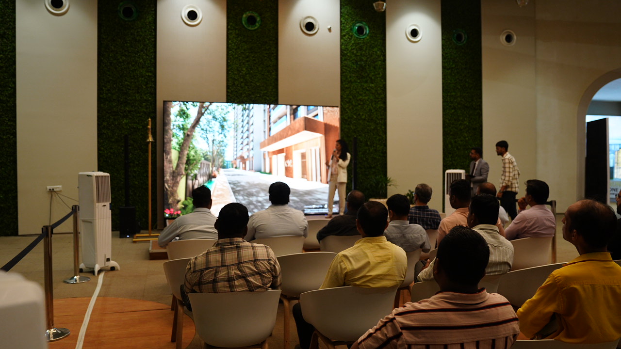 Real estate project presentation on a large digital screen