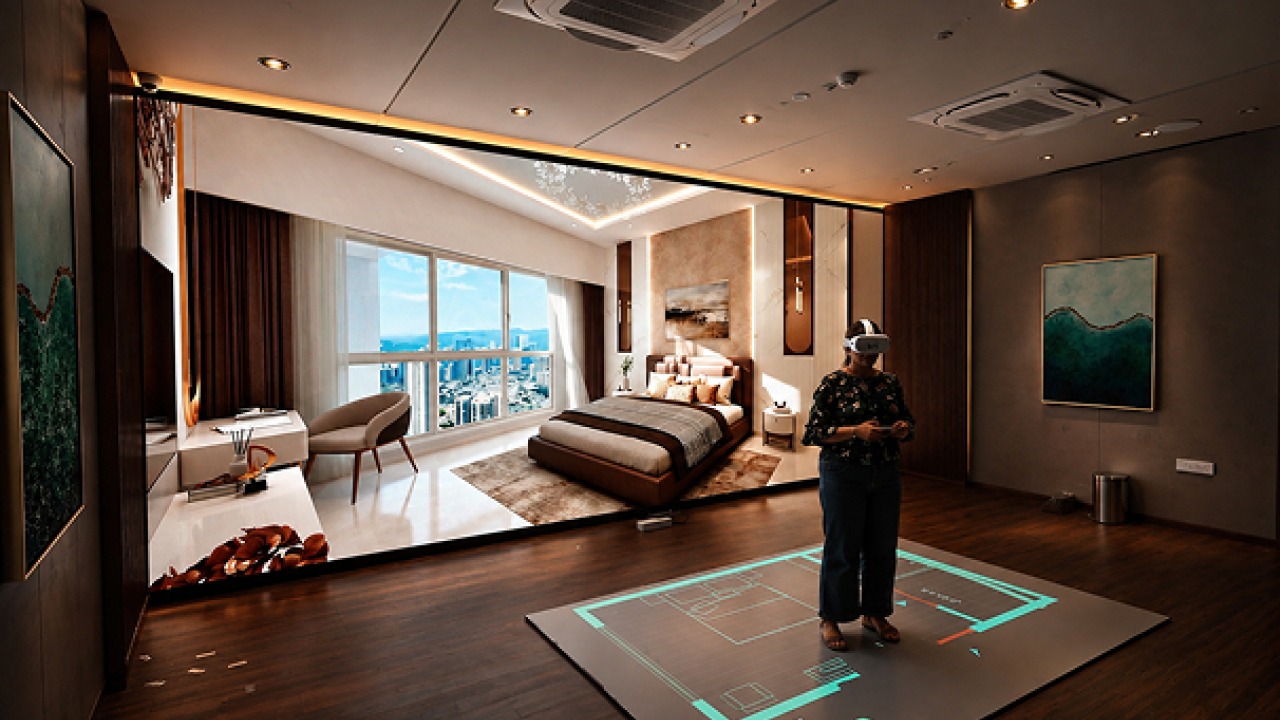 Visitor wearing a VR headset inside an immersive virtual apartment walkthrough at L&T Ahana